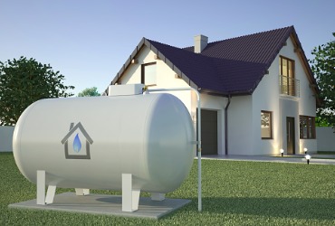 propane tank near a white house in the countryside