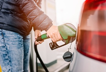 Person filling up gas tank, Gasoline Delivery in Bloomington IL